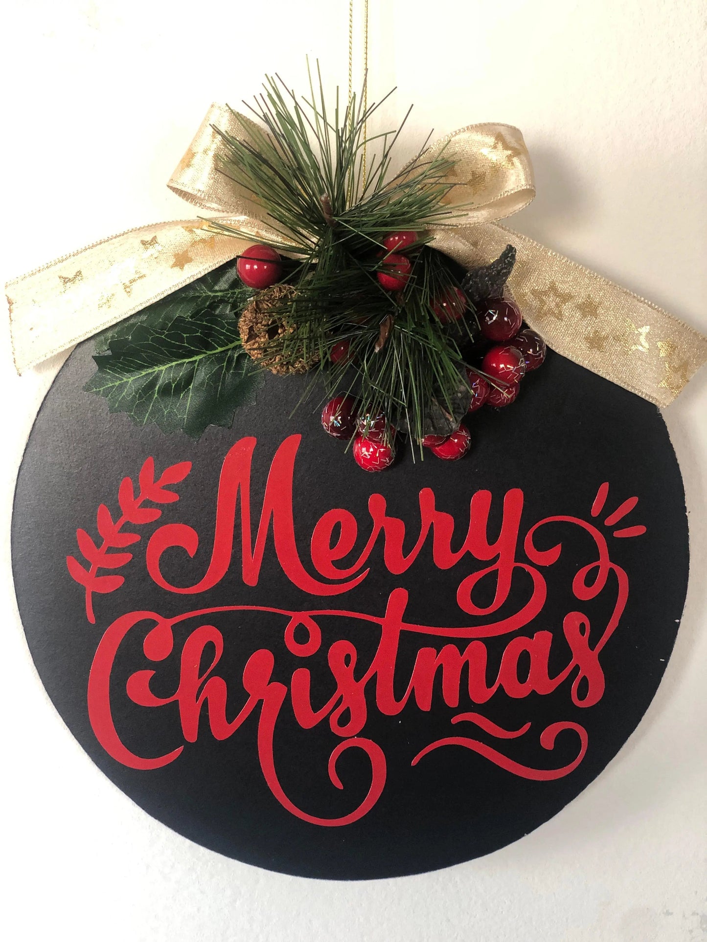 Christmas door hanger with festive holiday design