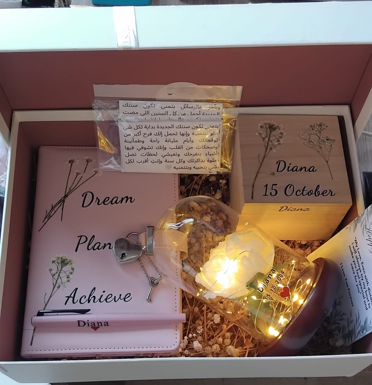 Exclusive Birthday gift box with notebook, pen, name-and-date keepsake, Arabic card and decorative lights