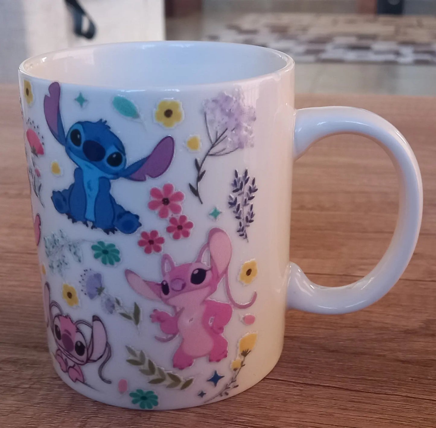 Stitch mug with colorful Disney character design
