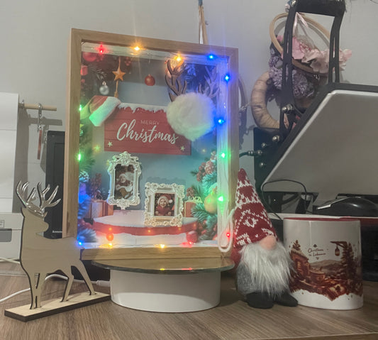 Wood-look Christmas shadow box with multicoloured lights, Merry Christmas design and two miniature portrait frames