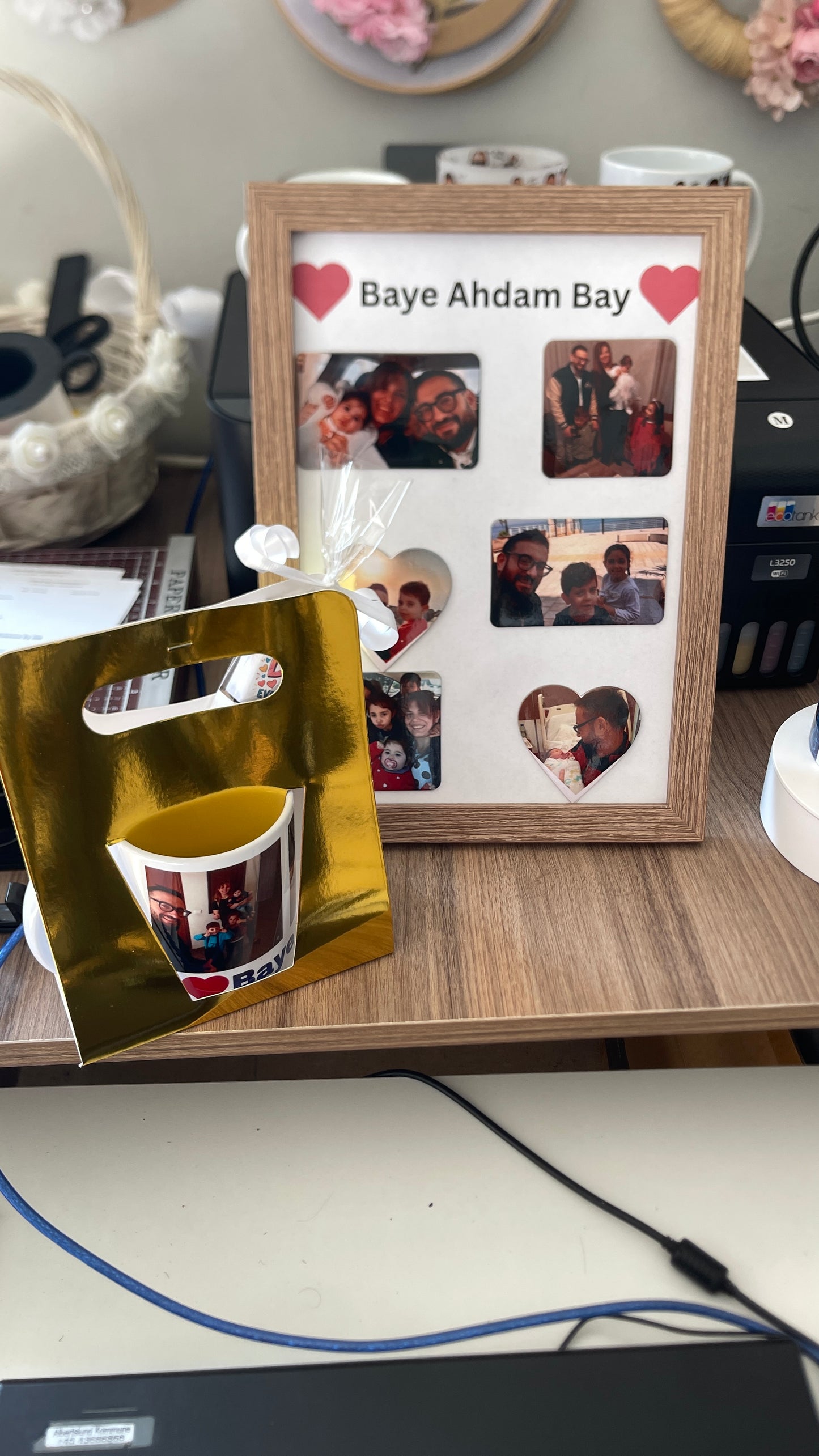 Decorative photo collage with heart shapes and a mug with printed design on a wooden surface.