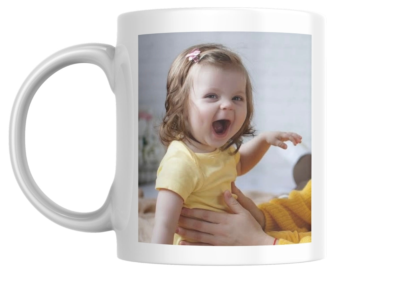 White mug with a photo of a child on it
